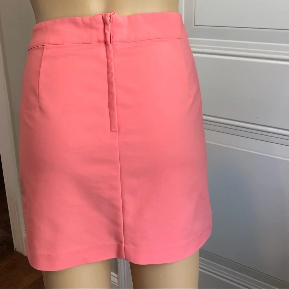 H&M coral mini skirt with front pockets